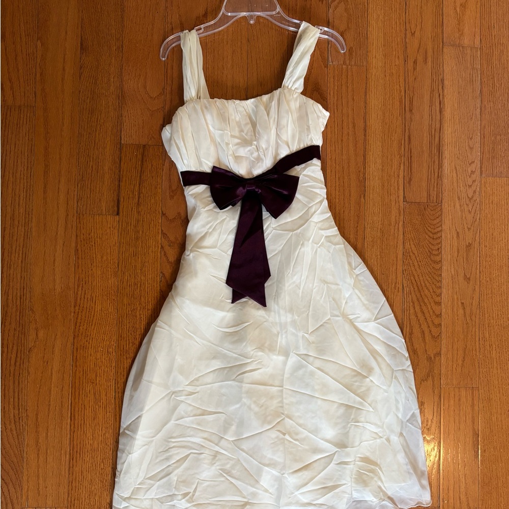 Elegant Cream Dress with Dark Bow